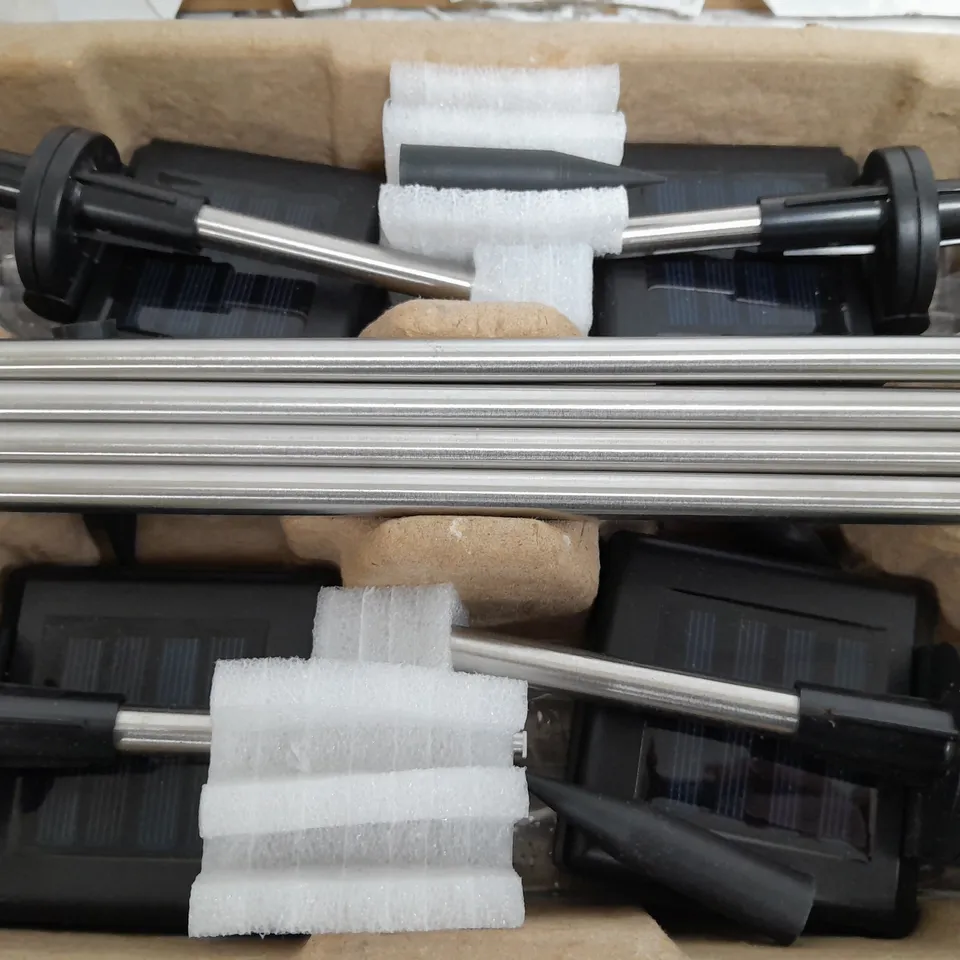 BOXED BELL & HOWELL GLIMMER STICKS SET OF 4 SOLAR PATHWAY LIGHTS