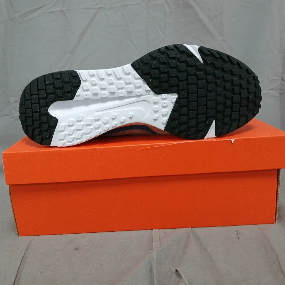 BOXED PAIR OF NIKE RUN DEFY TRAINERS IN PURE PLATINUM/BLUE SIZE UK 10