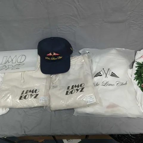 LARGE BOX OF ASSORTED LIMO BOYZ CLOTHING TO INCLUDE TEES, PANTS, AND CAPS ETC.