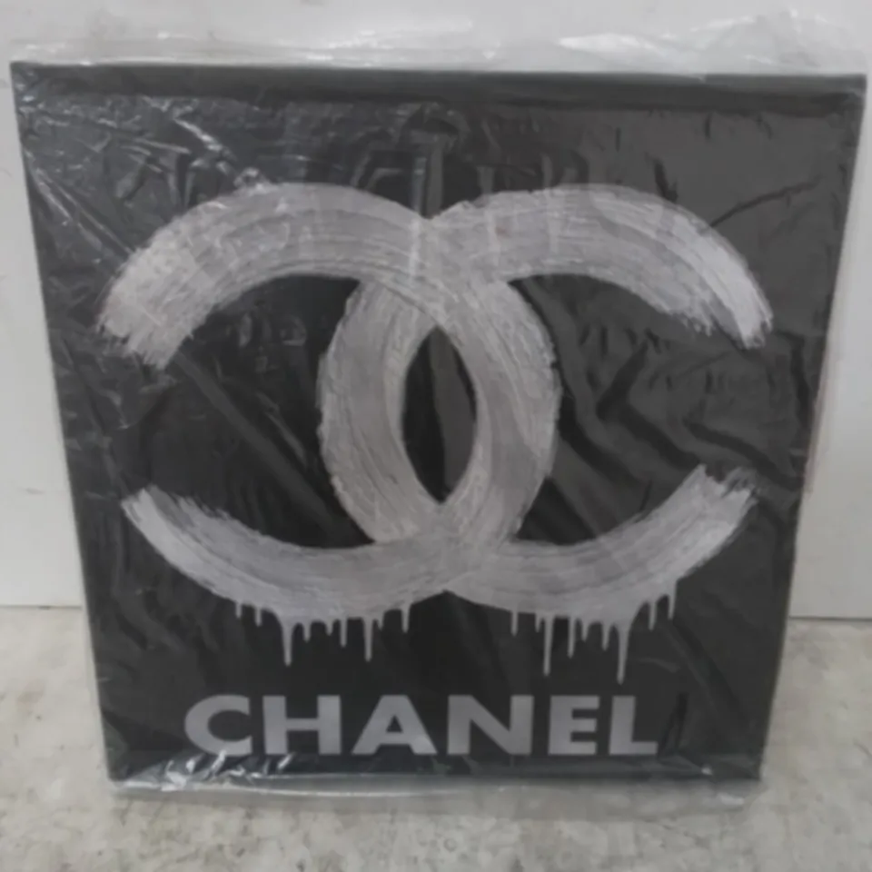 FASHION LOGO SILVER ON BLACK BY MADELINE BAKER - WRAPPED CANVAS 