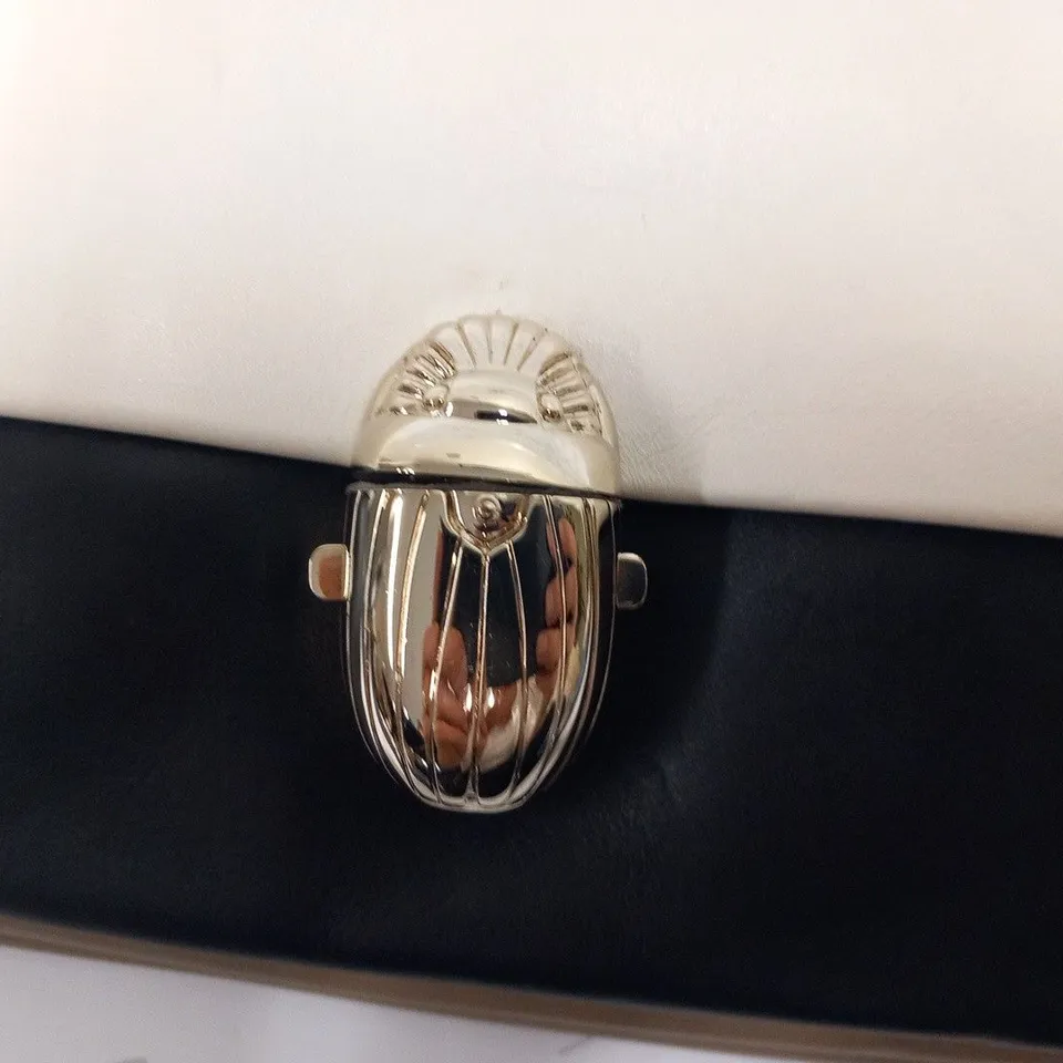 CHRISTIAN LOUBOUTIN KHEPIRA WHITE/BEIGE CLUTCH BAG
