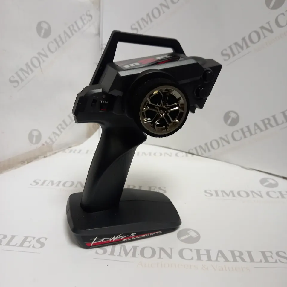 BOXED DRIVING 1/14 SCALE ELECTRIC CAR. 