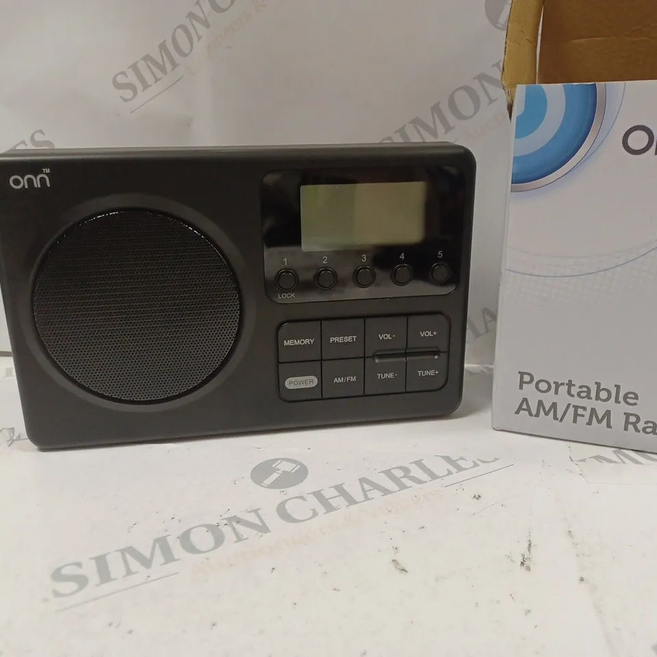 BOXED ONN PORTABLE AM/FM RADIO ONA20AA004A
