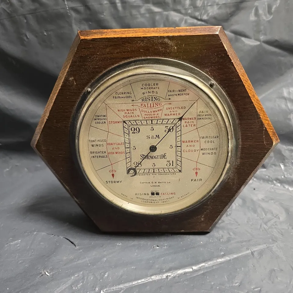 VINTAGE STORMGUIDE WEATHER DIAL IN OCTAGONAL WALNUT WOODEN CASE
