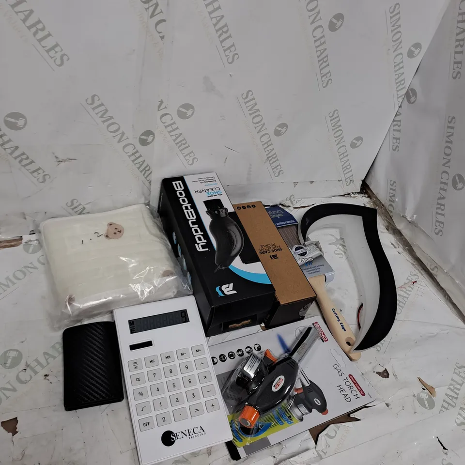 TOTE OF APPROXIMATELY 15 ASSORTED HOUSEHOLD  ITEMS TOO INCLUDE CALCULATORS , PAINT BRUSHES , SHOE CLEANER , ETC 