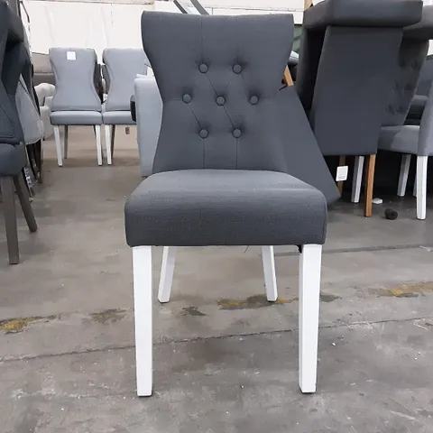 ONE UPHOLSTERED GREY DINING CHAIR WITH WHITE LEGS 