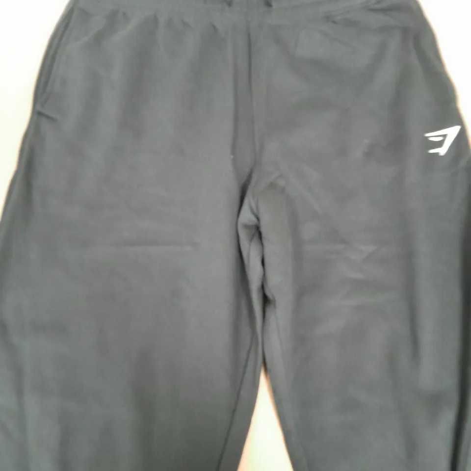GYMSHARK BLACK TRACKSUIT BOTTOMS - SIZE MMEDIUM
