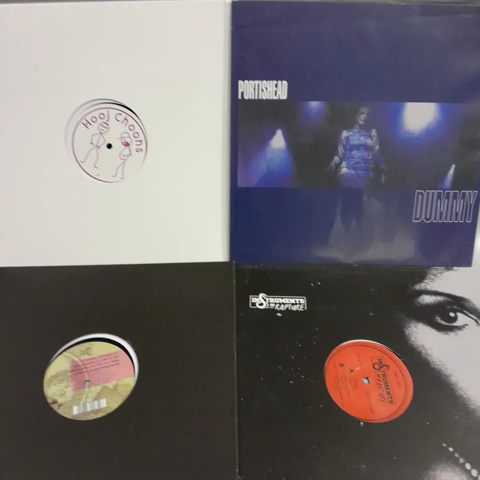 APPROXIMATELY 10 ASSORTED VINYLS FROM VARIOUS ARTISTS TO INCLUDE FATS DOMINO, ERIC CARMEN, PORTISHEAD ETC