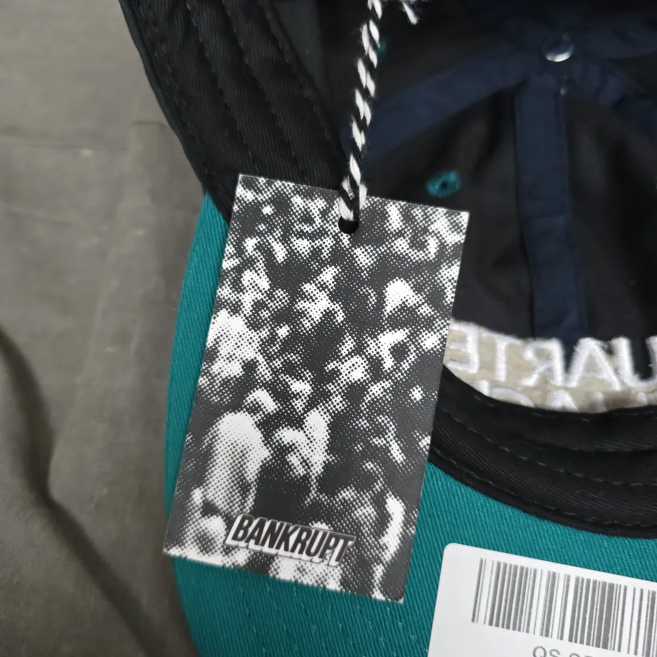 BANKRUPT JOURNALIST HAT – BLACK/GREEN