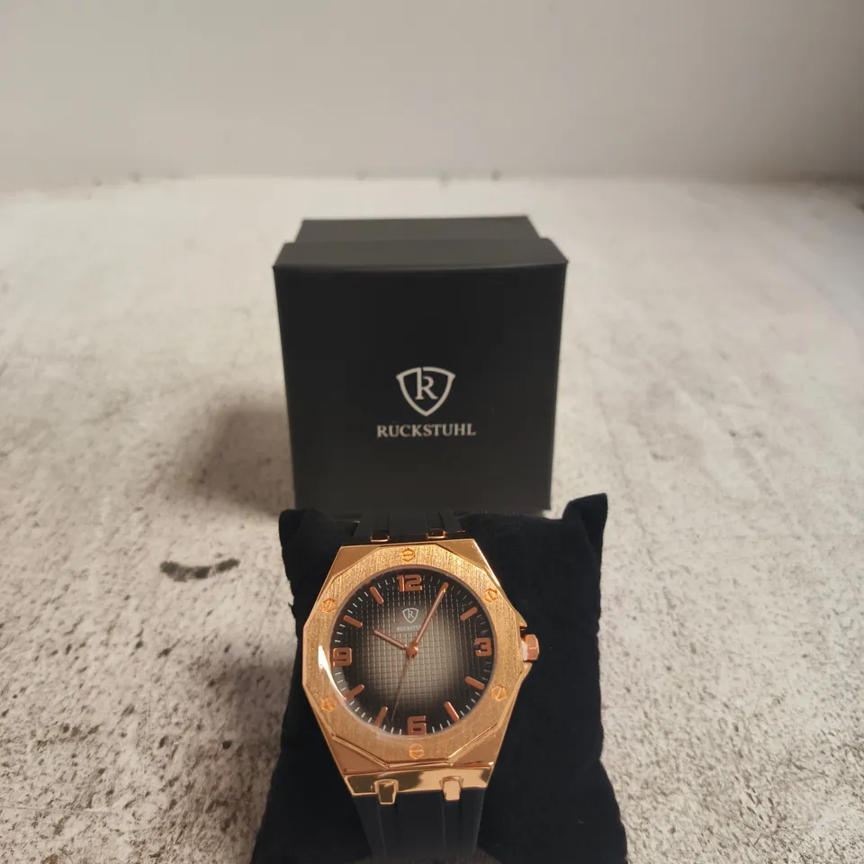 RUCKSTUHL ROSE GOLD-TONE OCTAGONAL CASE WRISTWATCH, BLACK RUBBER STRAP – BOXED