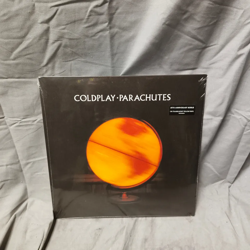 COLDPLAY – PARACHUTES 20TH ANNIVERSARY REISSUE ON TRANSLUCENT YELLOW VINYL (SEALED)