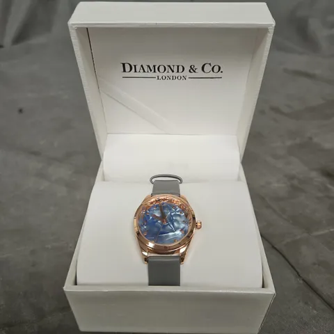DIAMOND & CO LONDON ROSE GOLD-TONE WRISTWATCH WITH BLUE DIAL