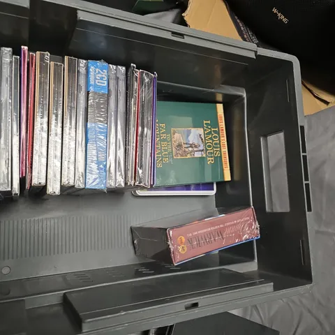 BOX OF ASSORTED DVDS AND CDS IN STORAGE BOX