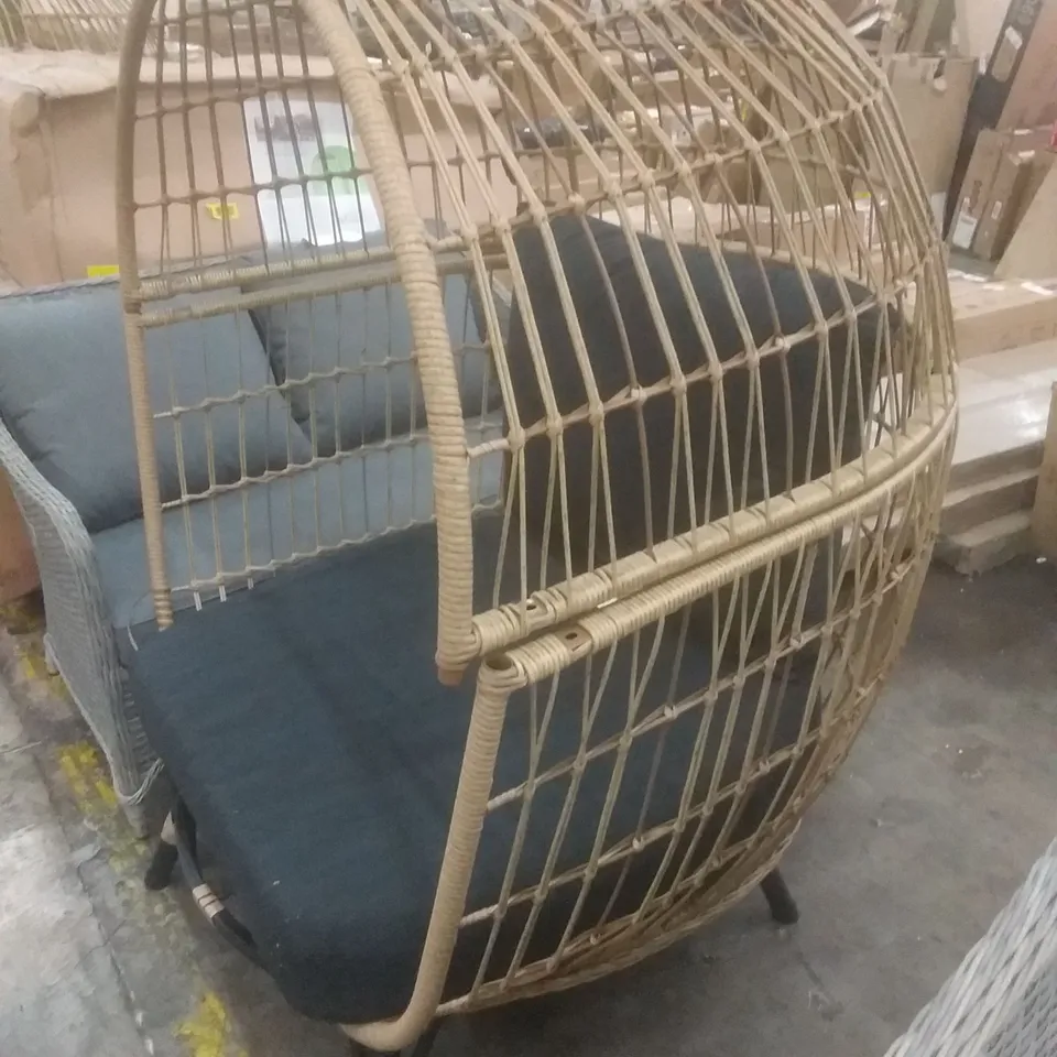 BROWN RATTAN EFFECT EGG CHAIR WITH BLACK CUSHIONS 