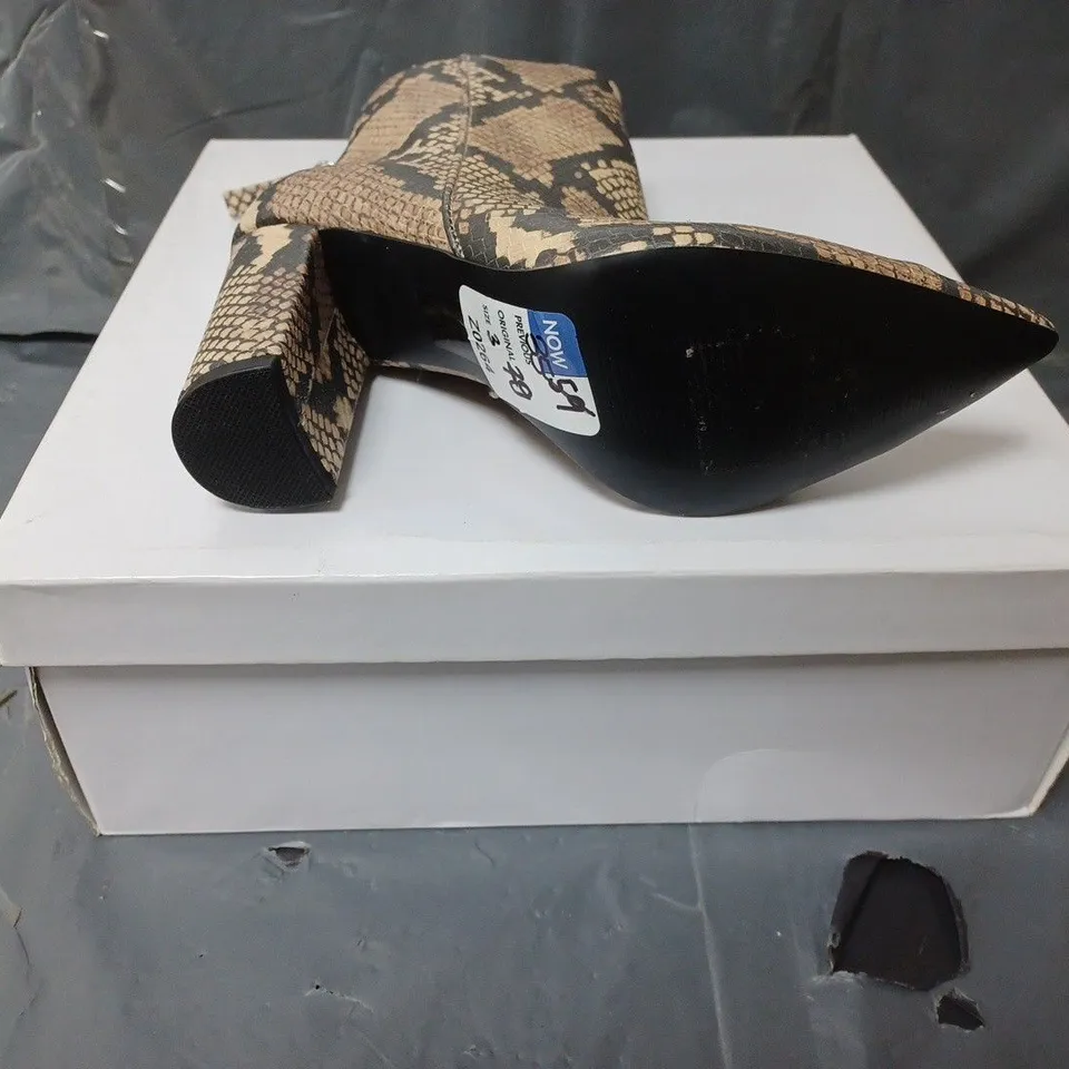 BOXED PAIR OF STEVE MADDEN SNAKE PRINT ANKLE BOOTS SIZE 36