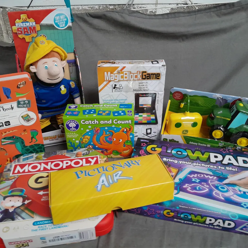 APPROXIMATLY 7 ASSORTED TOYS TO INCLUDE FIREMAN SAM TALKING PLUSH, MAGNETIC BOOK, MONOPOLY GO, PICTIONARY AIR, GLOWPAD