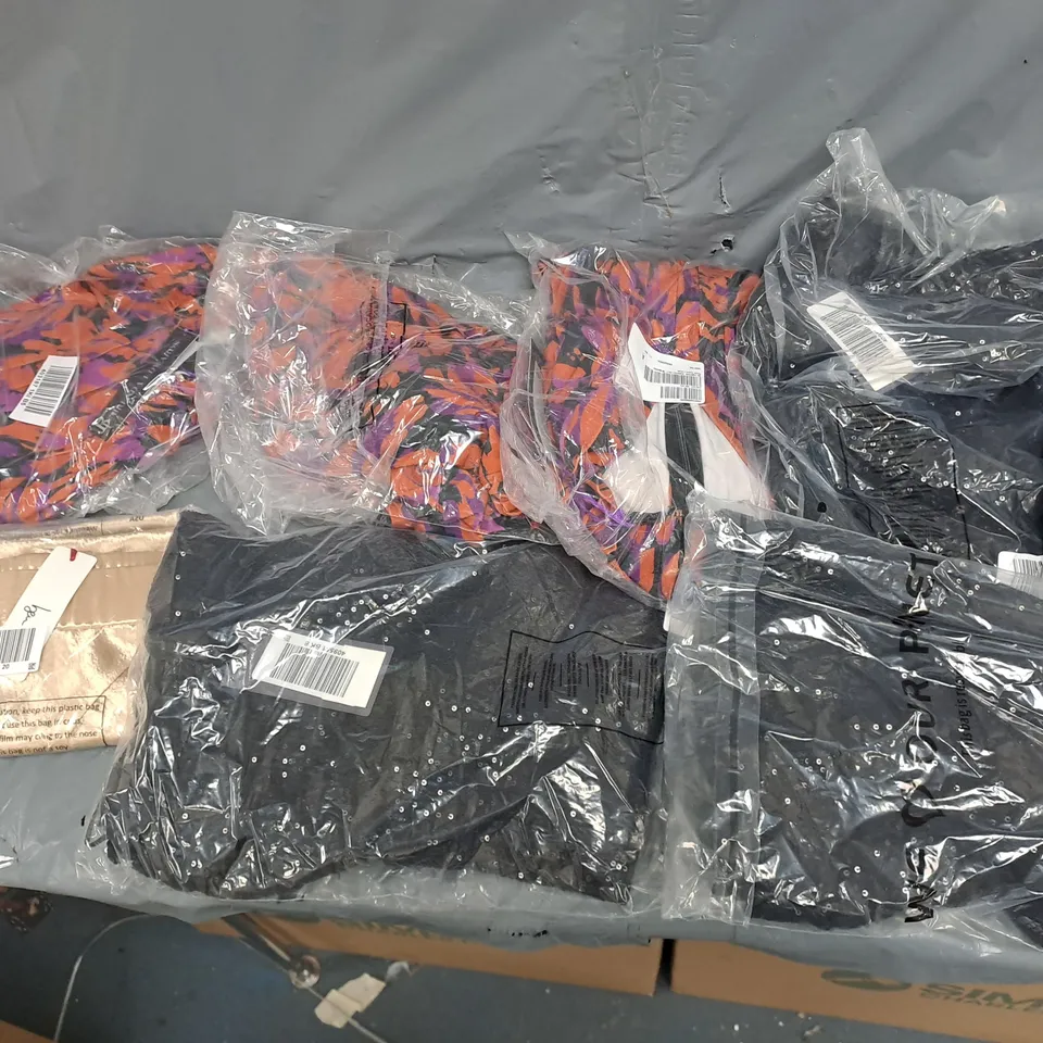 BOX OF APPROXIMATELY 10 ASSORTED BAGGED PIECES OF CLOTHING IN VARIOUS STYLES, SIZES, AND BRANDS 