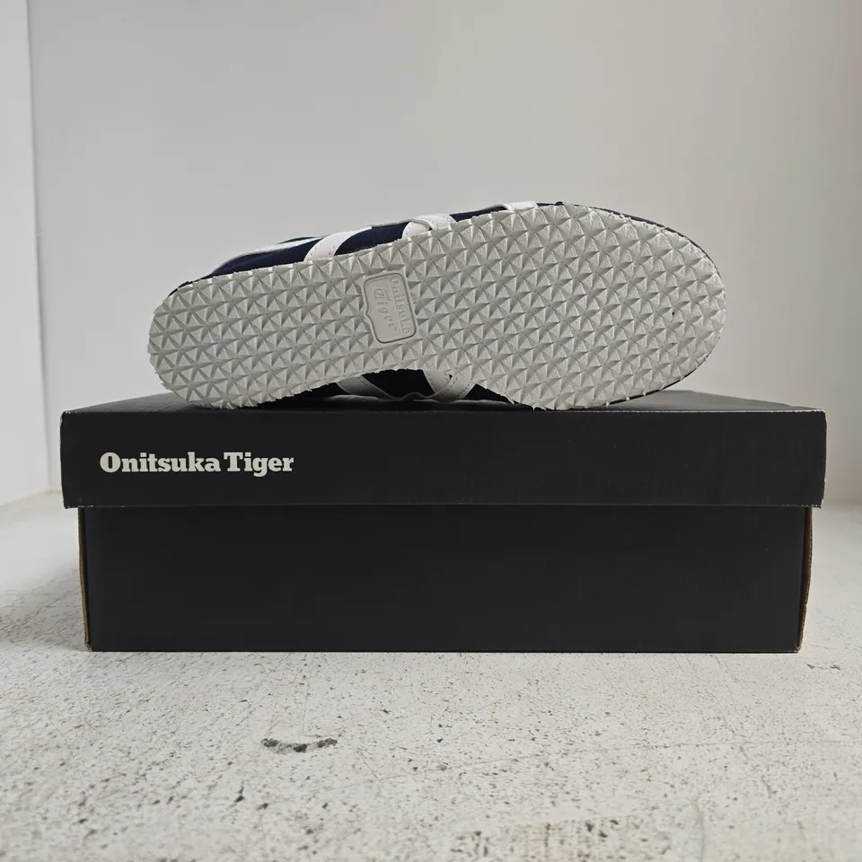 BOXED PAIR OF ONITSUKA TIGER TRAINERS IN NAVY/WHITE SIZE 3.5