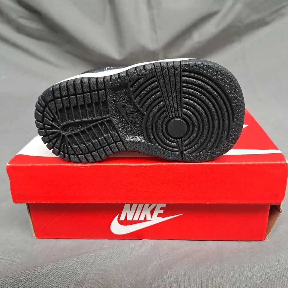 BOXED PAIR OF NIKE DUNK LOW SHOES IN WHITE/BLACK SIZE 2.5