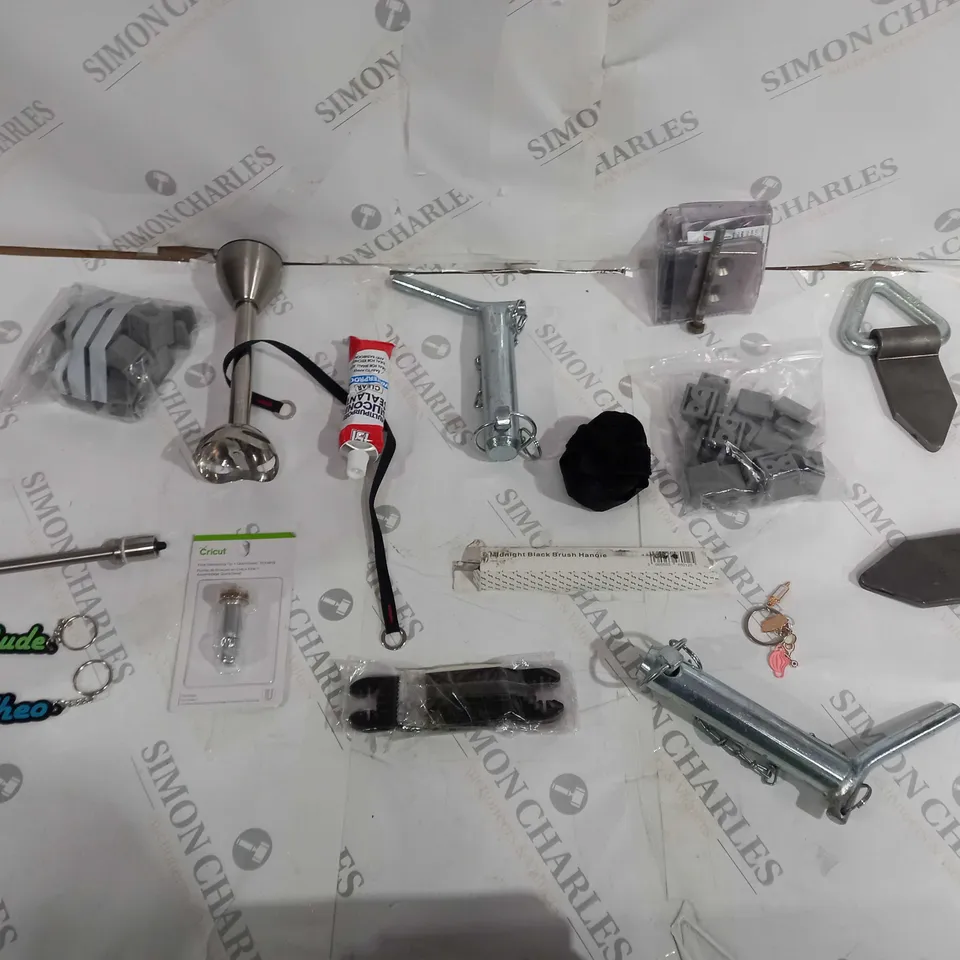 APPROXIMATELY 10 ASSORTED HOUSEHOLD ITEMS TO INCLUDE MIDNIGHT BLACK BRUSH HANDLE, CRICUT FINE DEBOSSING TIP, AND MAGNETS ETC. 