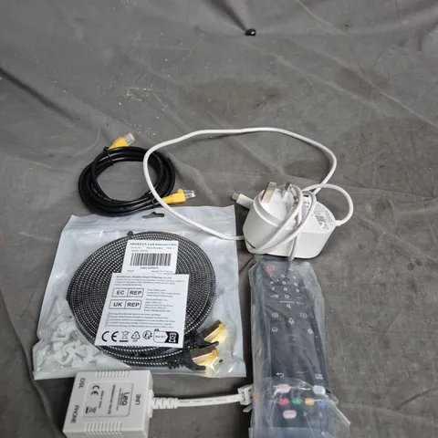 TOTE OF APPROXIMATELY 15 ELECTRICAL PRODUCTS TO INCLUDE TELEPHONE CABLES, REMOTE CONTROLS AND POWER ADAPTERS