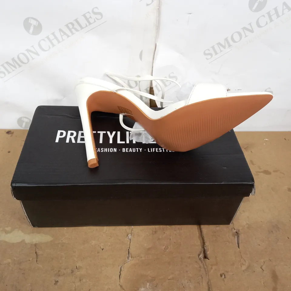 BOXED PAIR OF PRETTY LITTLE THING WHITE HIGH HEEL SANDALS SIZE 6