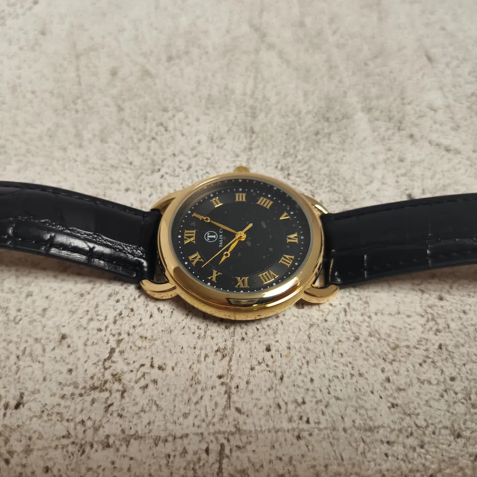 TALIS CO. GOLD-TONE WRISTWATCH IN BLUE BOX, BLACK DIAL & LEATHER STRAP