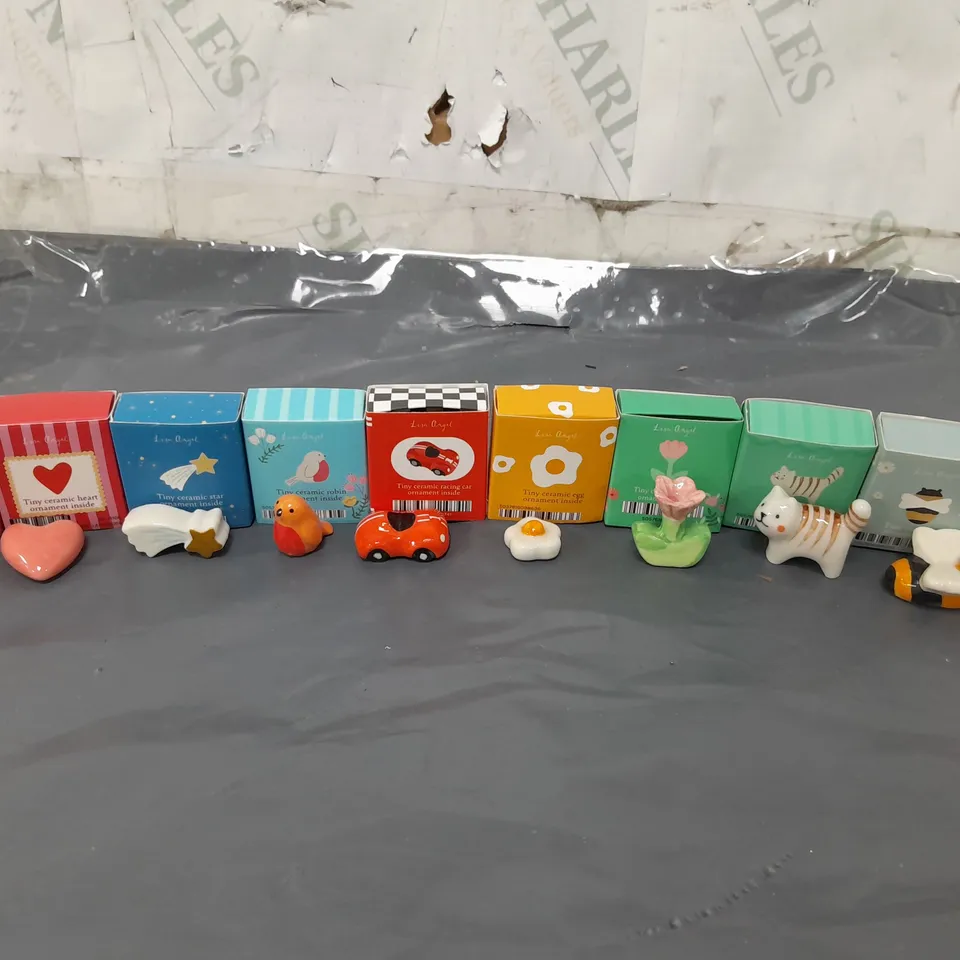 APPROXIMATELY 30 LISA ANGEL CERAMIC TOKENS IN VARIOUS DESIGNS