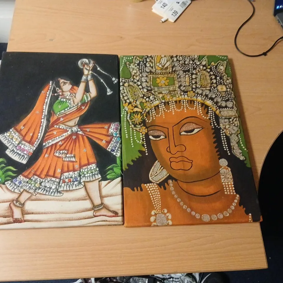 TWO  HANDMADE RAJASTHANI FABRIC STYLE WALL HANGINGS ONE DEPICTING A TRADITIONAL DANCER AND ONE DEPICTING A KERALA LADY