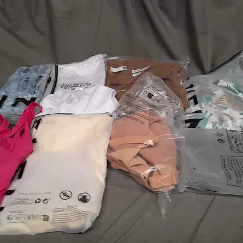 MEDIUM BOX OF ASSORTED CLOTHING ITEMS IN VARIOUS SIZES AND COLORS