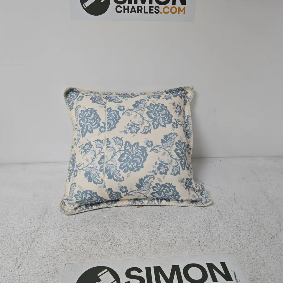 DECORATIVE CUSHION BLUE FLORAL PATTERN ON CREAM FABRIC