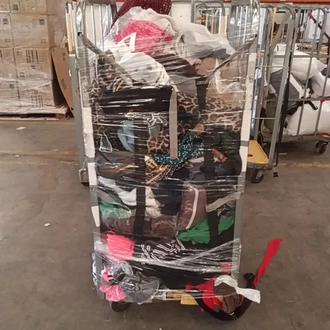 CAGE OF ASSORTED DESIGNER CLOTHING PIECES ( CAGE NOT INCLUDED ) 