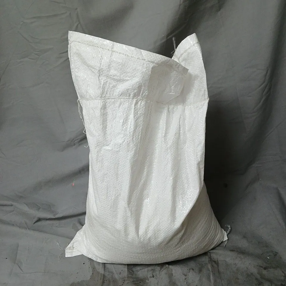 LARGE BAG OF WASHING POWDER, BRAND NOT SPECIFIED