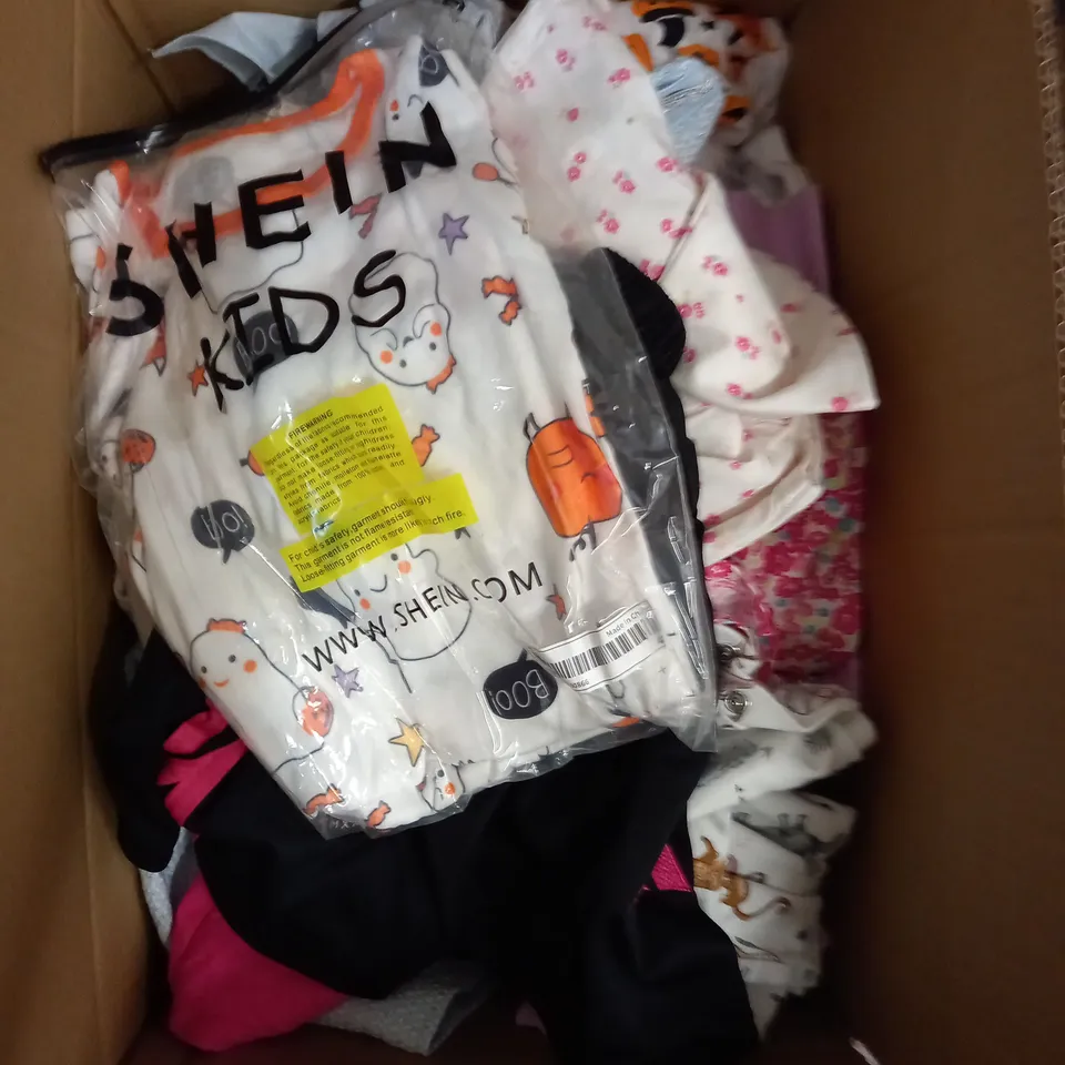 MEDIUM  BOX OF ASSORTED KIDS CLOTHING ITEMS TO INCLUDE BAGS, BABY GROWS AND DRESSES