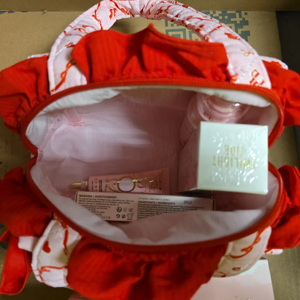 PLOUISE COSMETICS BAG TO INCLUDE OVERNIGHT BRIGHTENING CREAM, DOUBLE LAYER TONER AND LIP DRIP LIP GLOSS