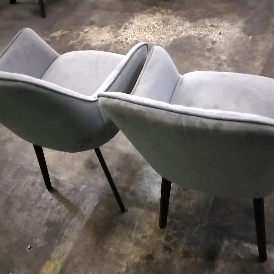 DESIGNER PAIR OF LIGHT GREY PLUSH VELVET PILLOWED DINING CHAIRS WITH ARMREST AND BLACK LEGS