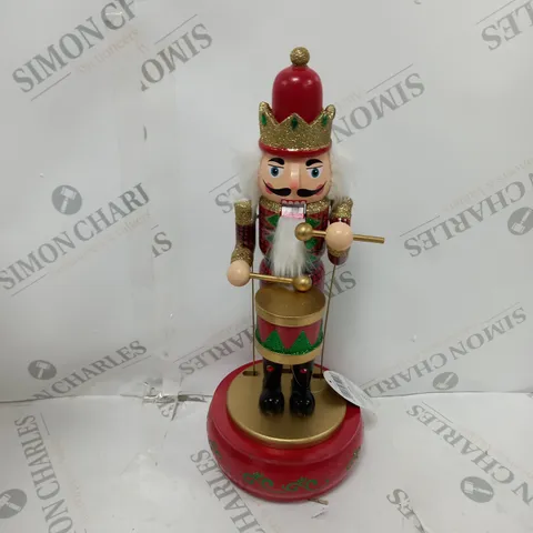 FESTIVE 32CM WOODEN ANIMATED MUSICAL NUTCRACKER
