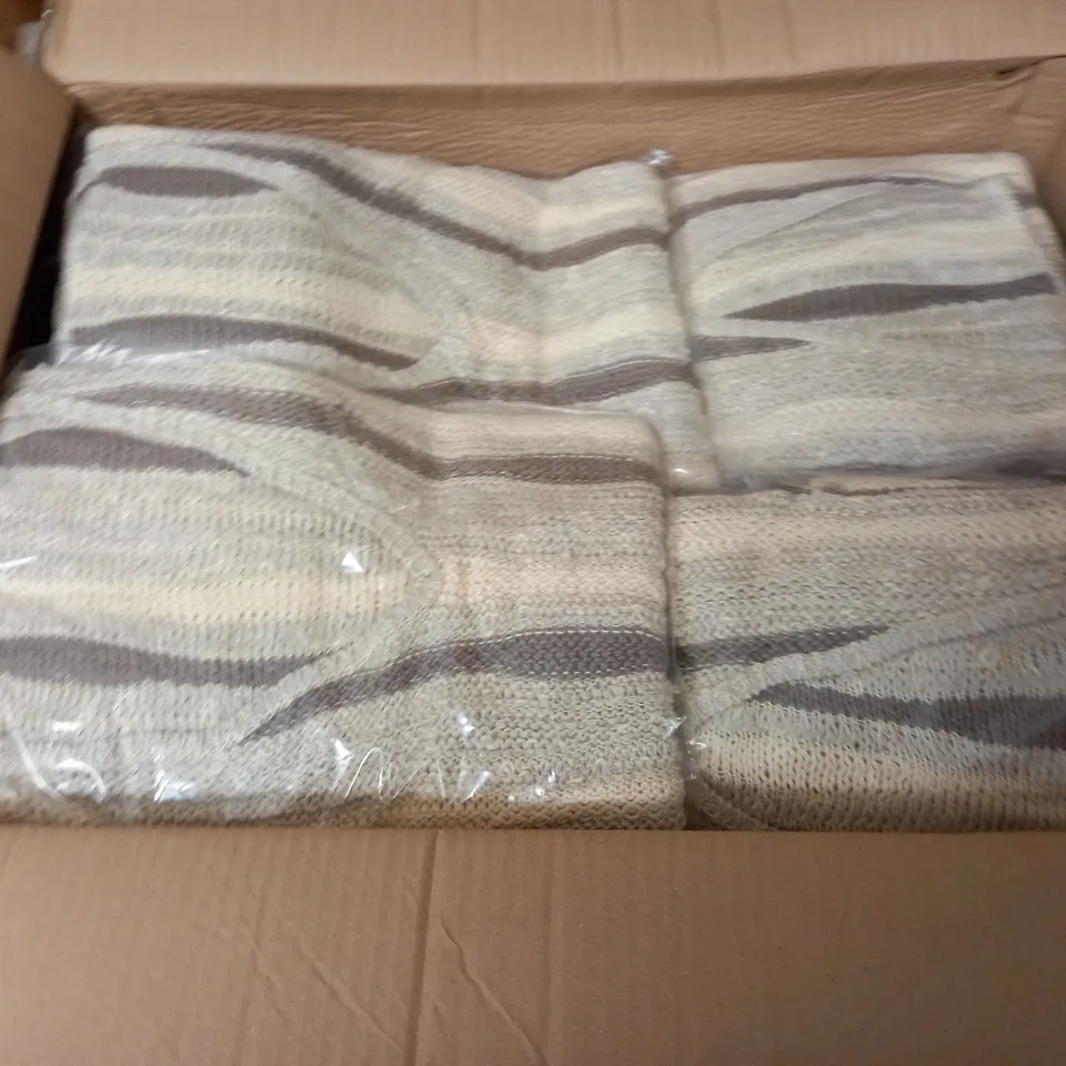 LOT OF APPROXIMATELY 20 V-NECK JUMPERS IN NATURAL - SIZE UNSPECIFIED