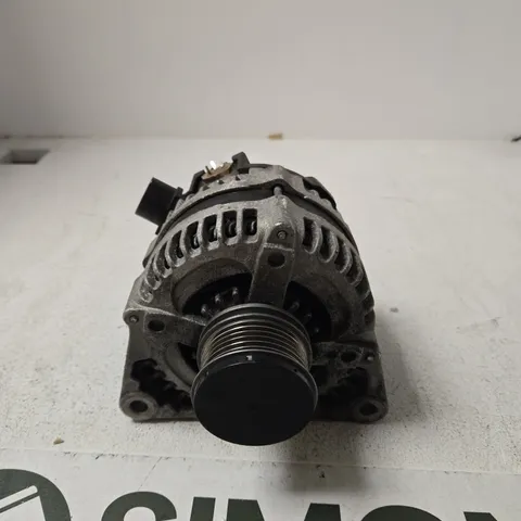 USED AUTOMOTIVE ALTERNATOR WITH PULLEY AND MOUNTING BRACKET