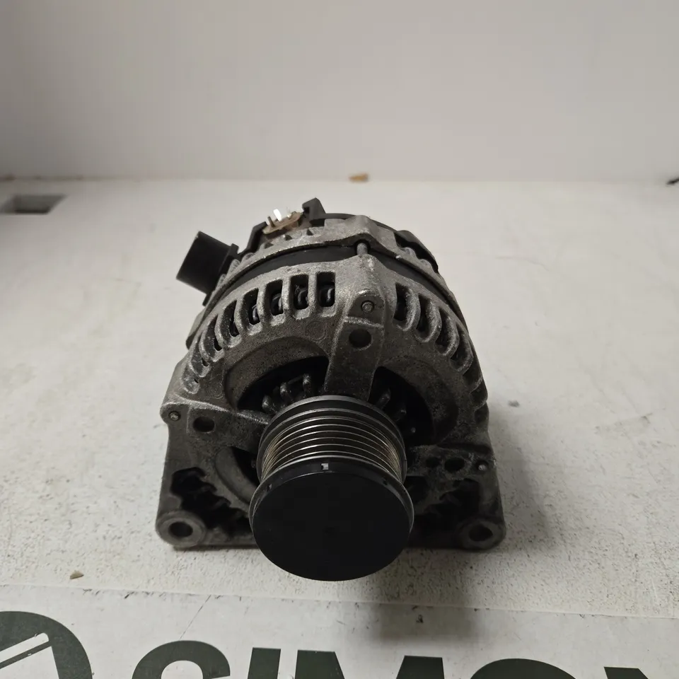 USED AUTOMOTIVE ALTERNATOR WITH PULLEY AND MOUNTING BRACKET
