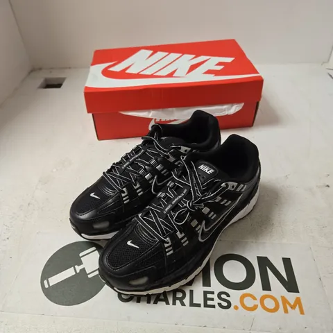 NIKE P-6000 MENβS TRAINERS β BLACK/WHITE, UK 7 (US 8)