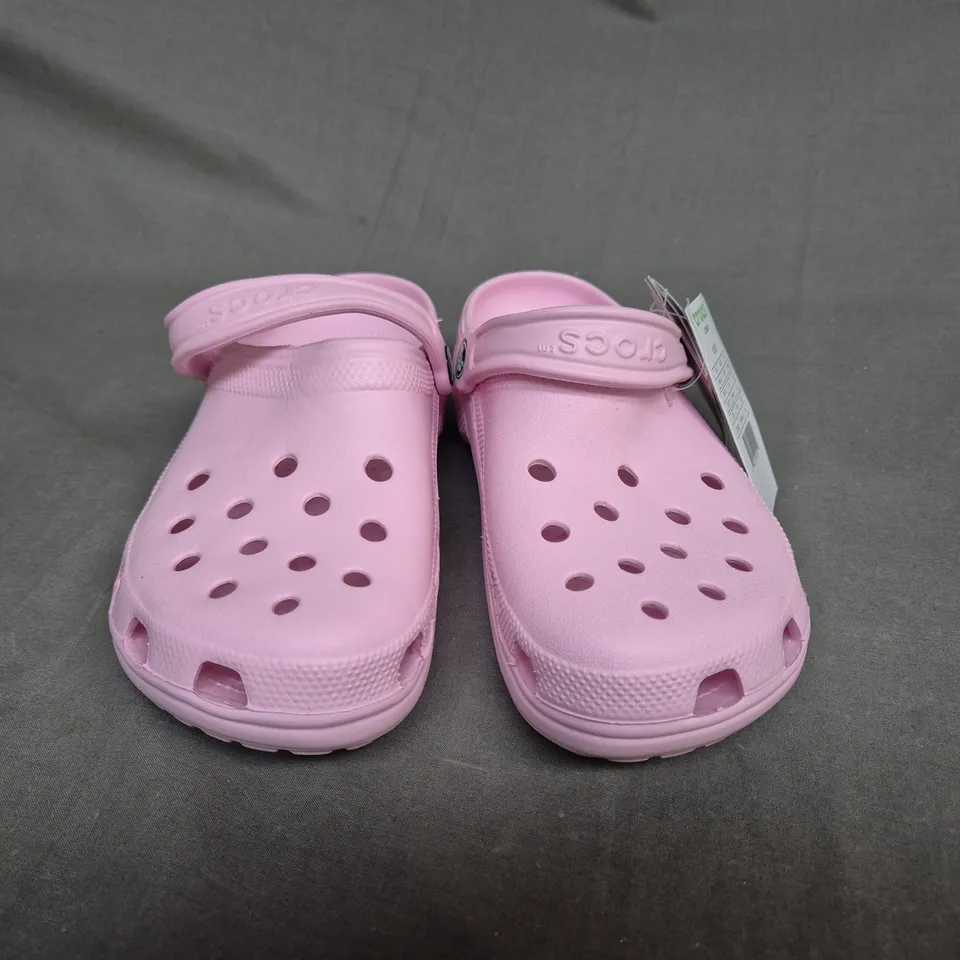 PAIR OF CROCS CLASSIC CLOGS IN PINK SIZE 5