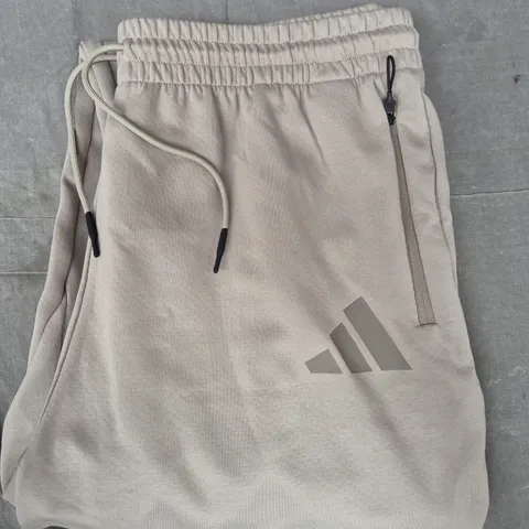 ADIDAS LOOSE FIT STRAIGHT LEG JOGGERS IN STONE SIZE 2XL