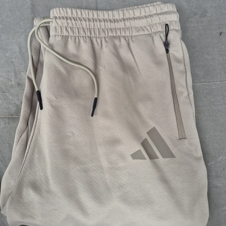 ADIDAS LOOSE FIT STRAIGHT LEG JOGGERS IN STONE SIZE 2XL