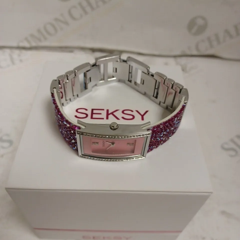 BOXED SEKSY BY SEKONDA LADIES STONE SET WATCH WITH STAINLESS STEEL BACK - JAPAN MOVEMENT. 