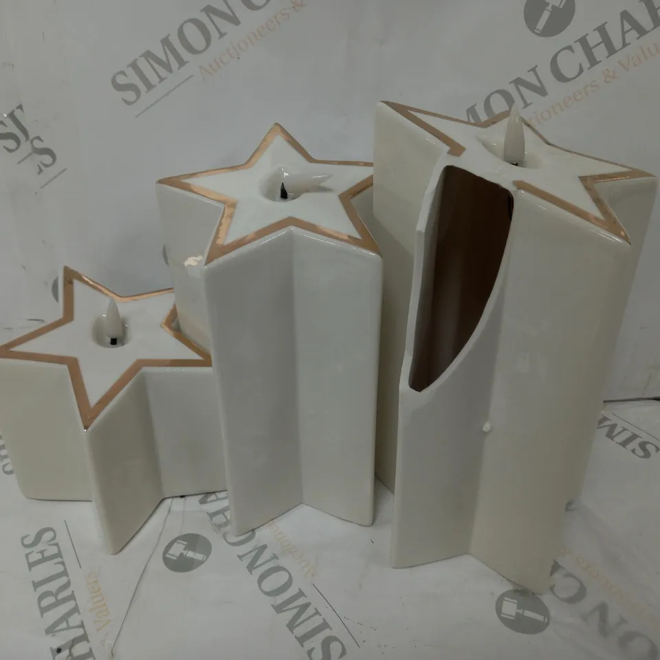 SET OF 3 PRE-LIT WHITE STAR CANDLES 