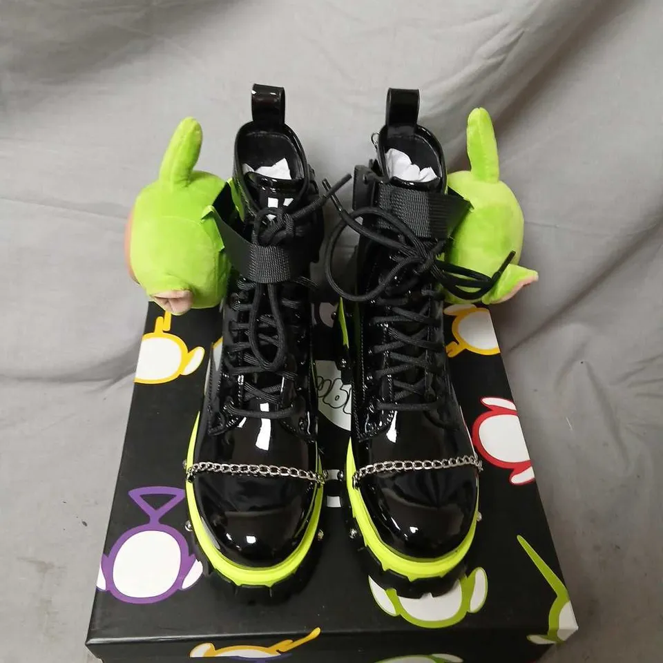 TELETUBBIES X KOI TUBBYTRONIC DIPSY BOOTS – BLACK PATENT BOOTS WITH NEON LIME SOLE, UK4