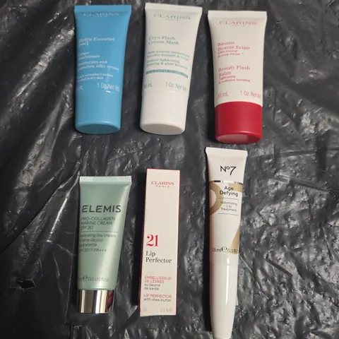 LOT OF 6 ASSORTED COSMETIC PRODUCTS TO INCLUDE - CLAIRINS 21 LIP PERFECTOR - N07 AGE-DEFYING VOLUMIZING LIP TREATMENT - ELEMIS PRO-COLLAGEN MARINE CREAM - ETC