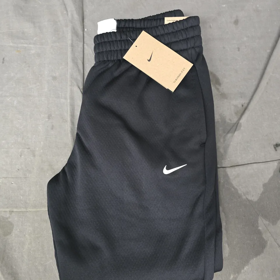 NIKE KIDS STANDARD FIT PANTS IN BLACK SIZE MEDIUM