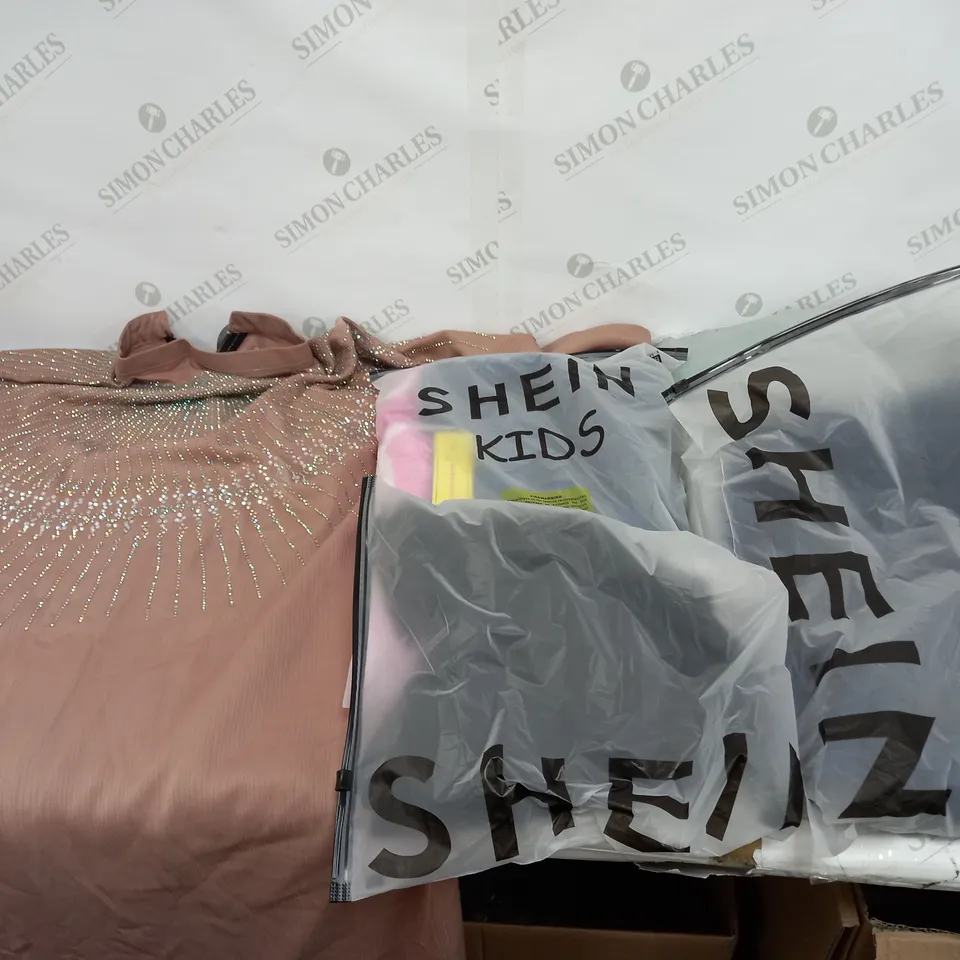 LARGE BOX OF ASSORTED CLOTHING ITEMS IN VARIOUS COLOURS AND SIZES INCLUDING TROUSERS , TOPS AND JUMPERS 